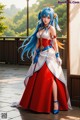 A woman in a red and white dress with blue hair.